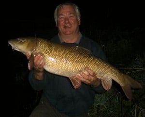 Chairman Paul Kitching with a 14lb 15oz Barbel Chairman Paul Kitching with a 14lb 15oz Barbel